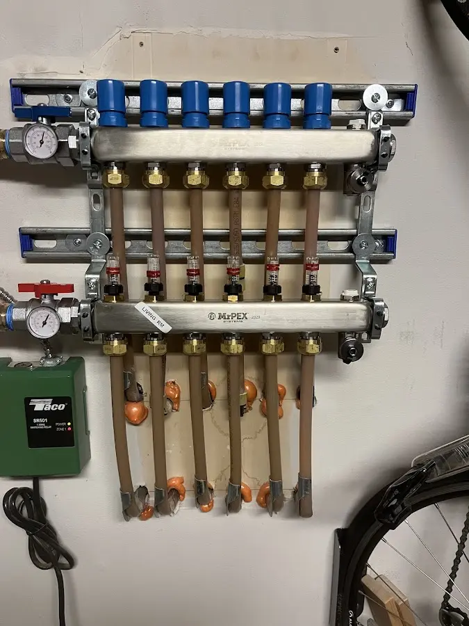 Plumber performing Gas Line Installation at a residential property in Fallsburg